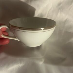 A Royalton China Co. translucent porcelain teacup with fine china markings.